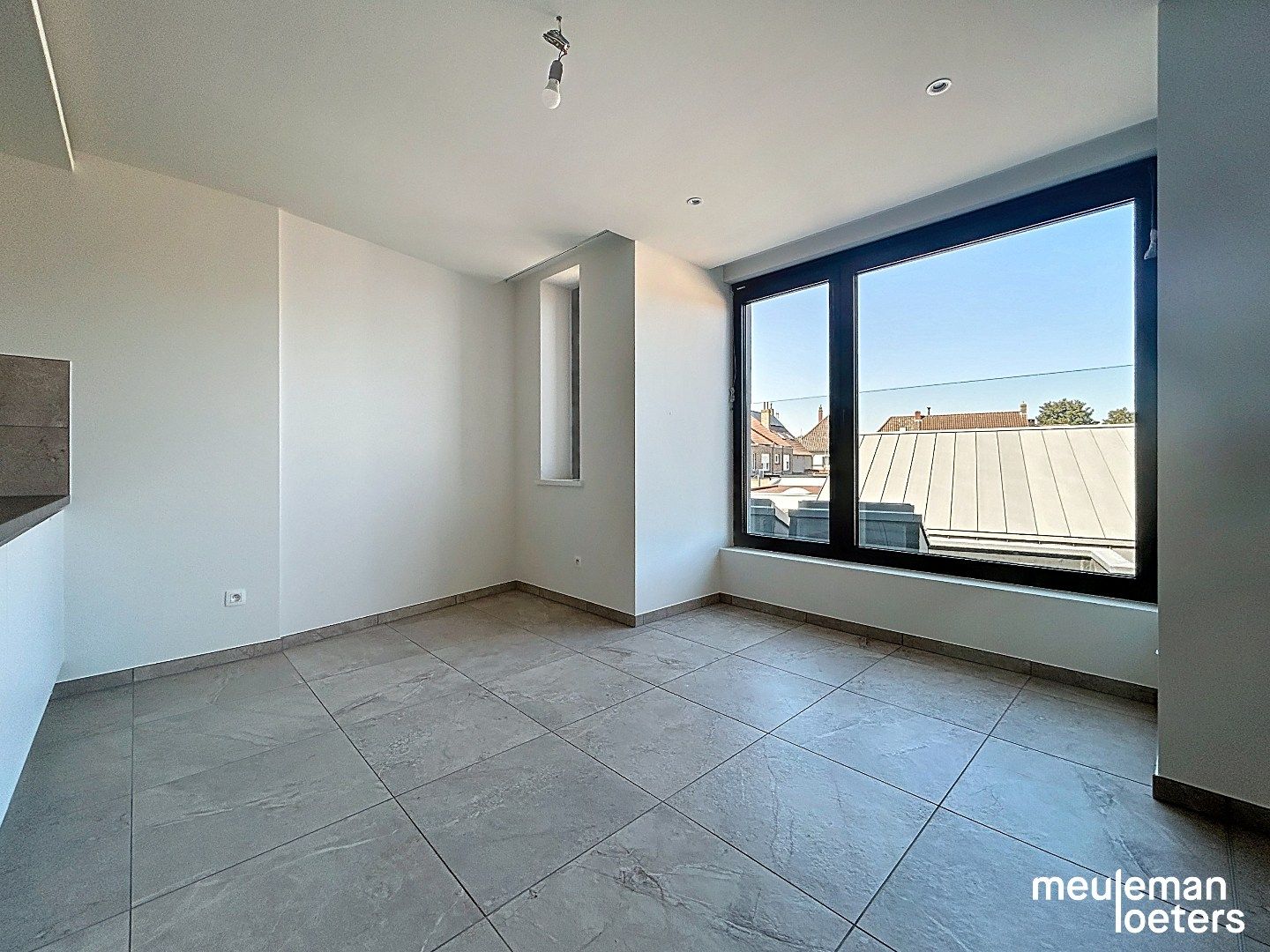 Ruim nieuwbouwappartement met garage foto 3