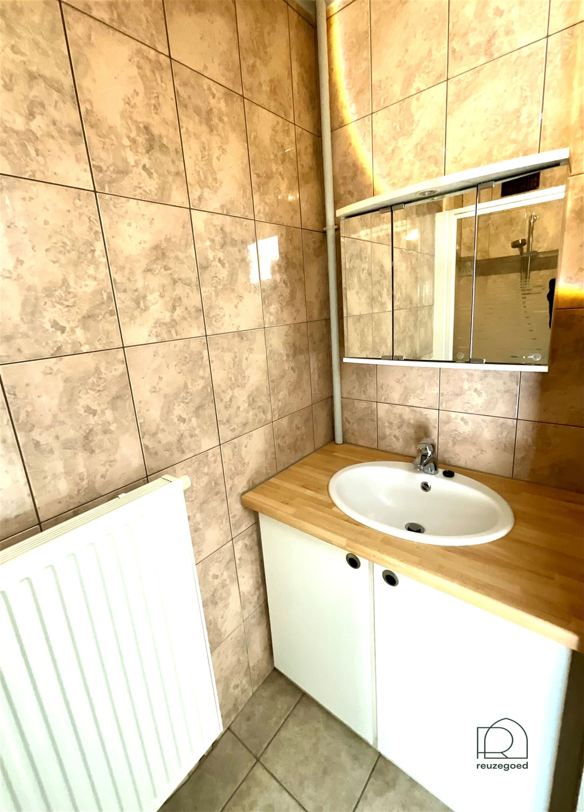Gelijkvloers appartement met één slaapkamer en een leuke tuin op het zuidwesten, gelegen in Mechelen! foto 12