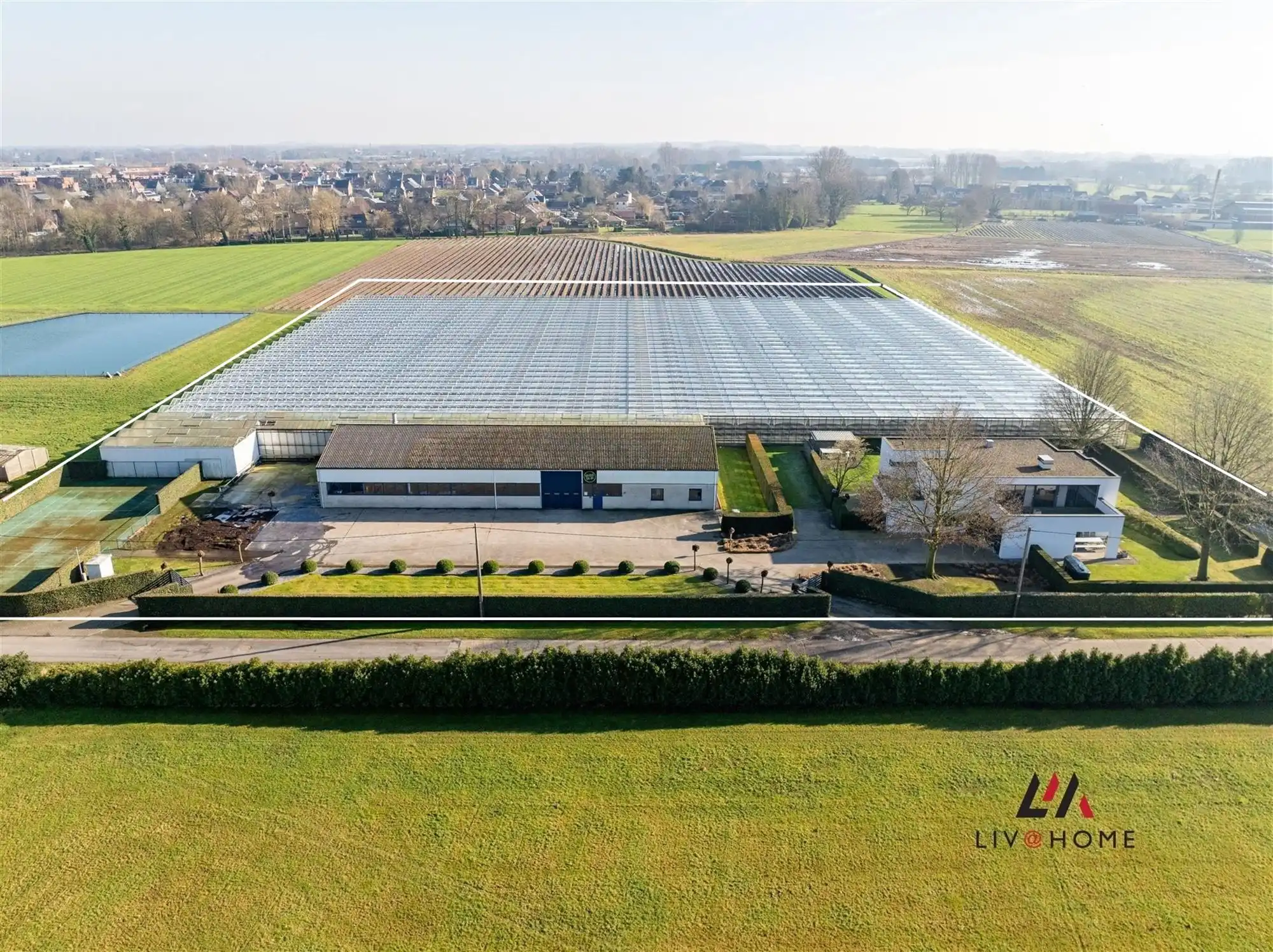 Moderne landbouwwoning met serre en loods op +/- 2  ha foto 3