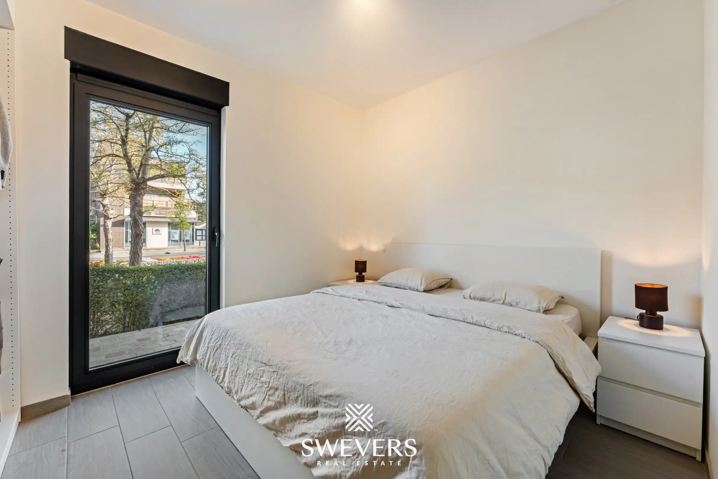 Appartement met twee autostaanplaatsen en terras met uitzicht op prachtige binnentuin foto 8
