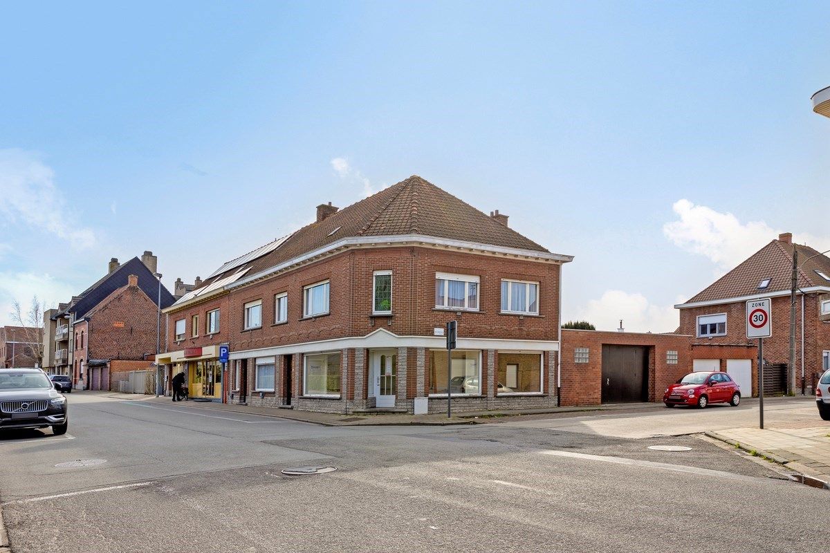 Handelswoonst met 4 slaapkamers en 3 garages! foto 22