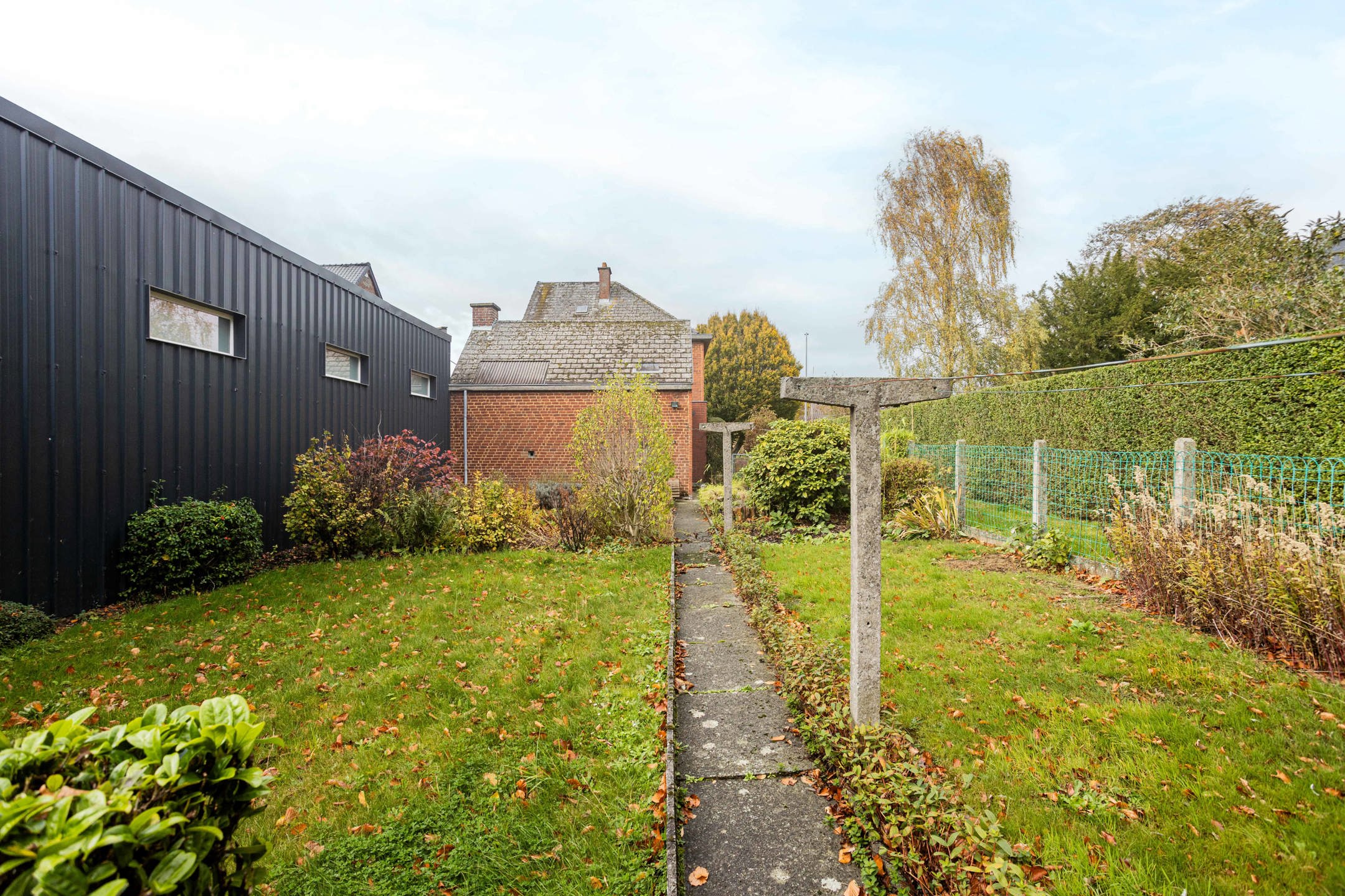 Gunstig gelegen halfopen bebouwing met garage. foto 23