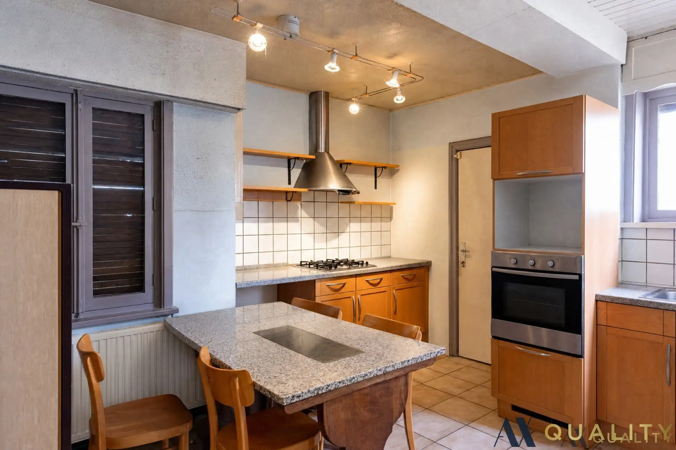 Te renoveren gesloten bebouwing met garage, ruime tuin en groenzicht in Oppuurs foto 6