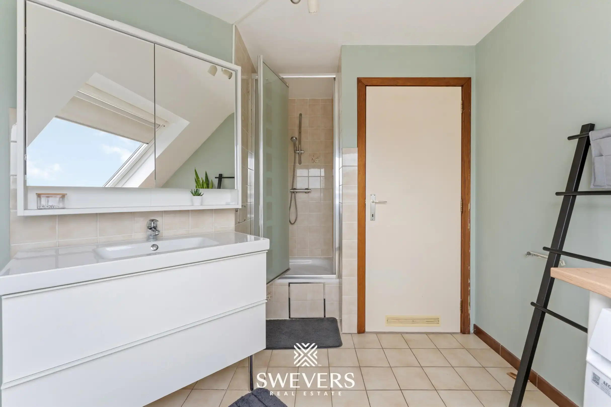 Instapklaar en lichtrijk 1-slaapkamerappartement op topligging in Houthalen centrum foto 17