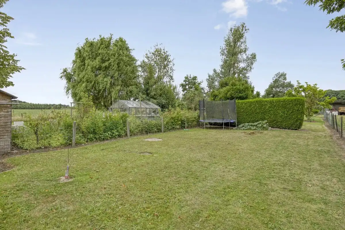 OPBRENGSTEIGENDOM BESTAANDE UIT TWEE RUIME EN VERHUURDE APPARTEMENTEN IN HERK-DE-STAD foto 6