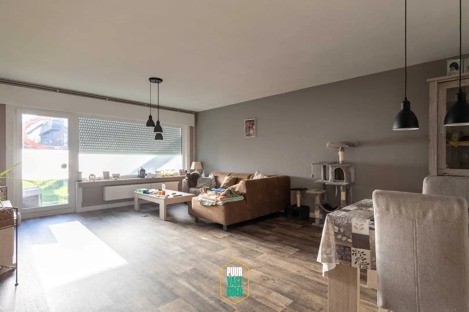 Hoofdfoto van de publicatie: Riant gerenoveerd gelijkvloers appartement met terras aan tuin