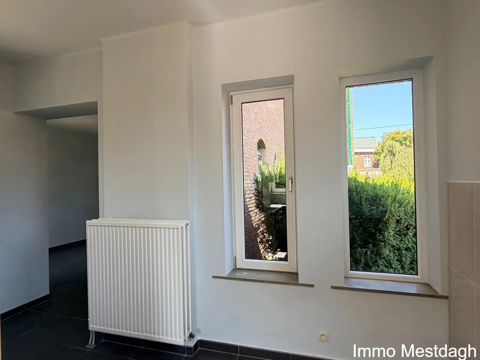 Prachtig gerenoveerd gelijkvloers appartement met terras en tuin in centrum Rummen foto 2