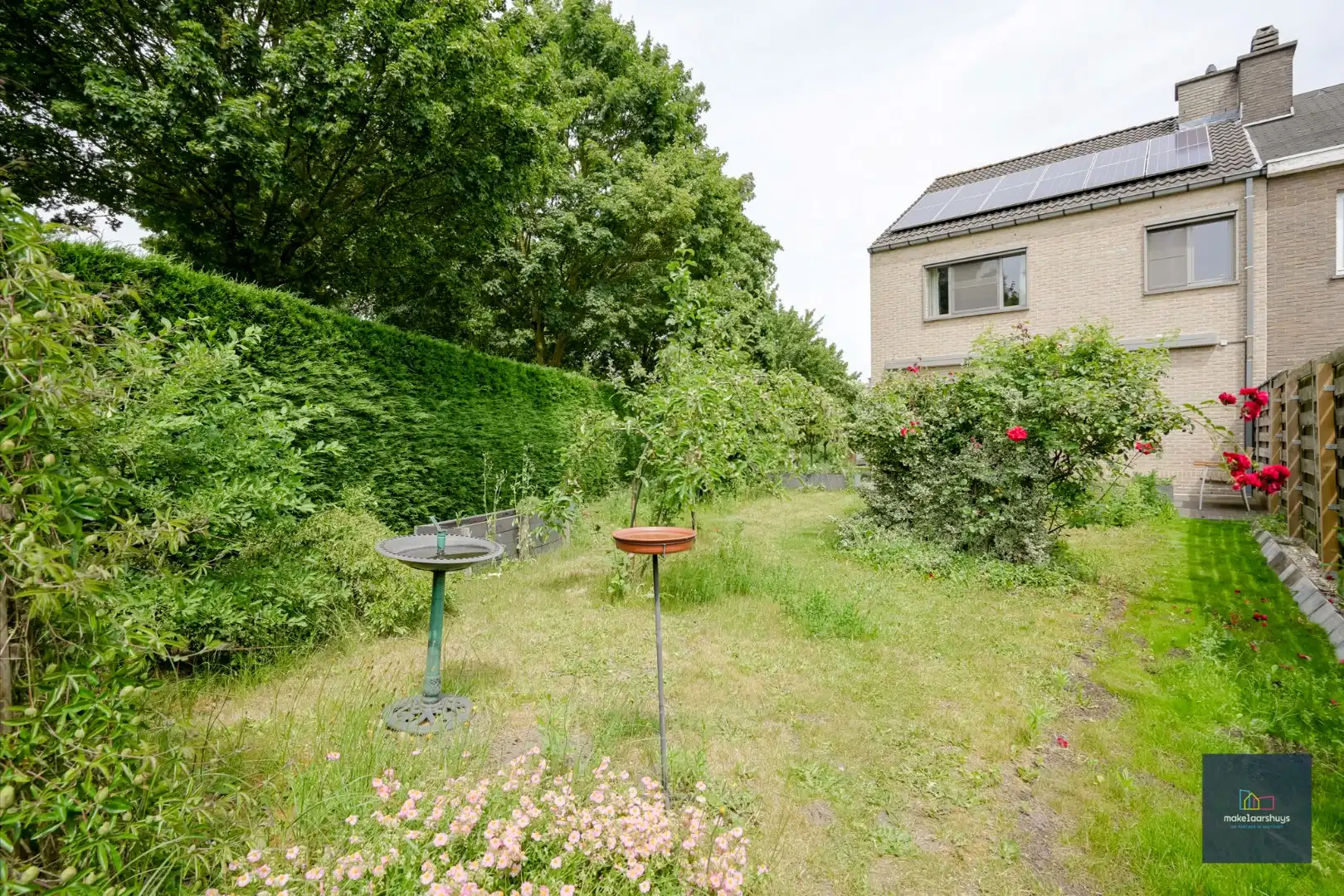 Ruime en  instapklare halfopen bebouwing met tuin  foto 35