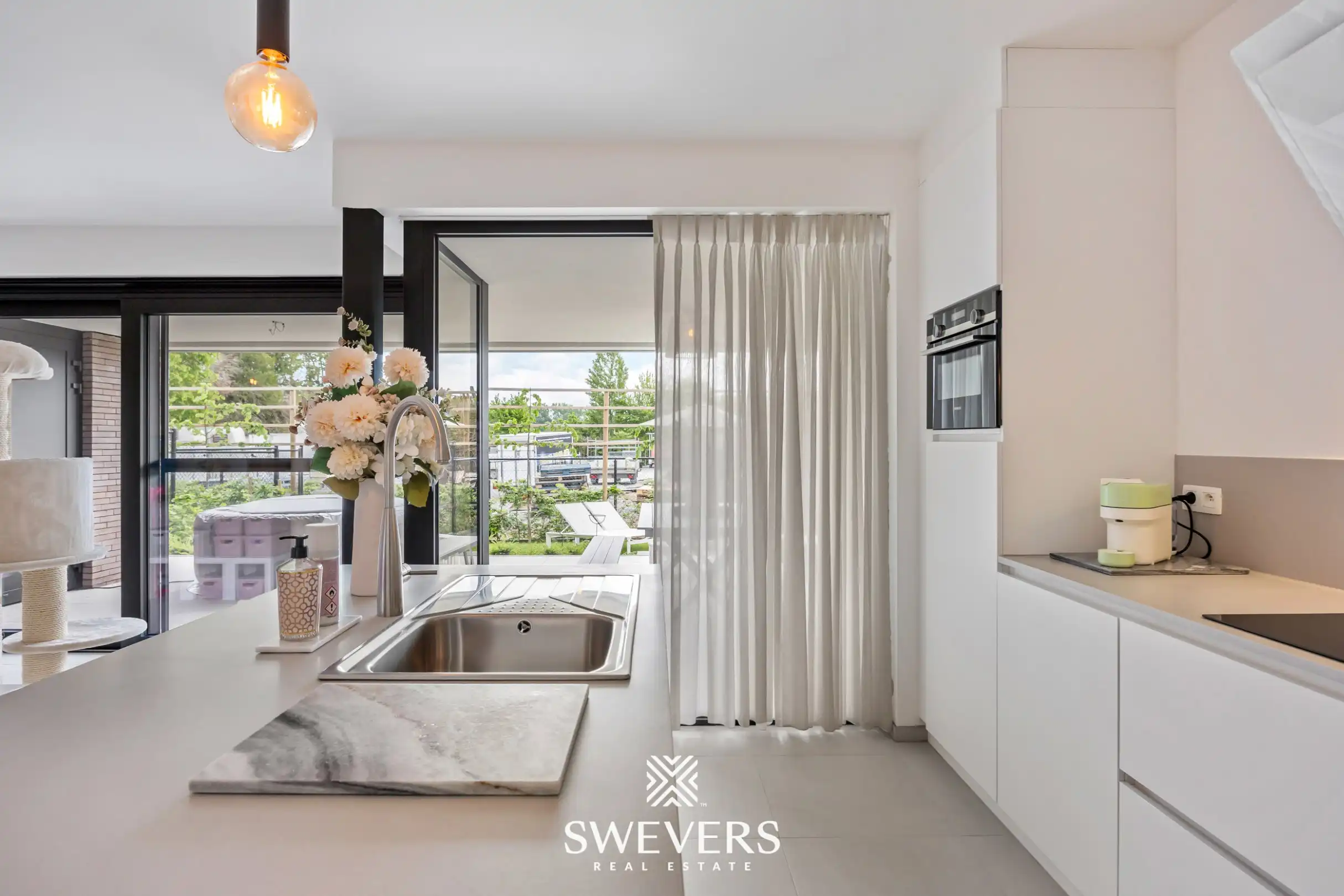 Nieuwbouwappartement met ruim terras, privétuin en ondergrondse staanplaats foto 7