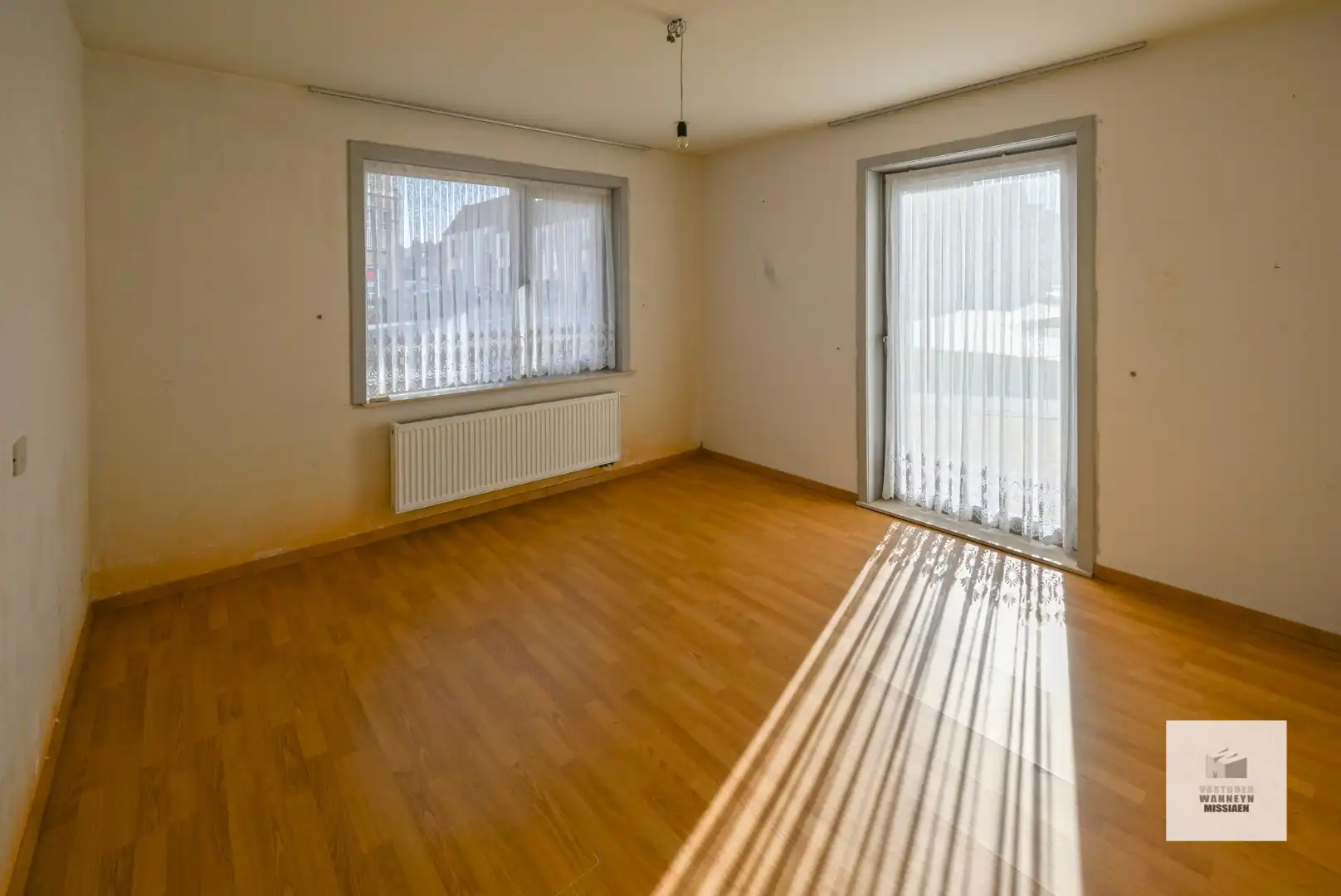 Ruim gelijkvloers appartement met 2 slpk en zonnige tuin/terras foto 10