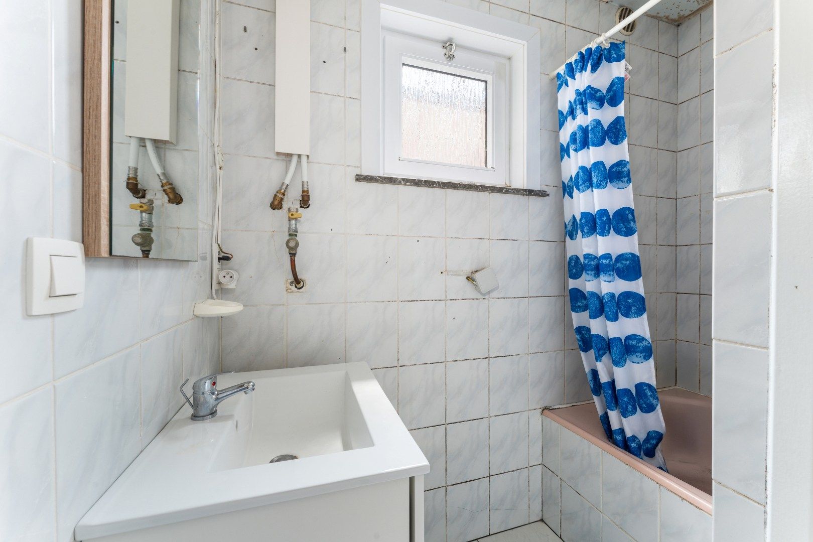 Centrale rijwoning met drie slaapkamers en terras in hartje Roeselare foto 14