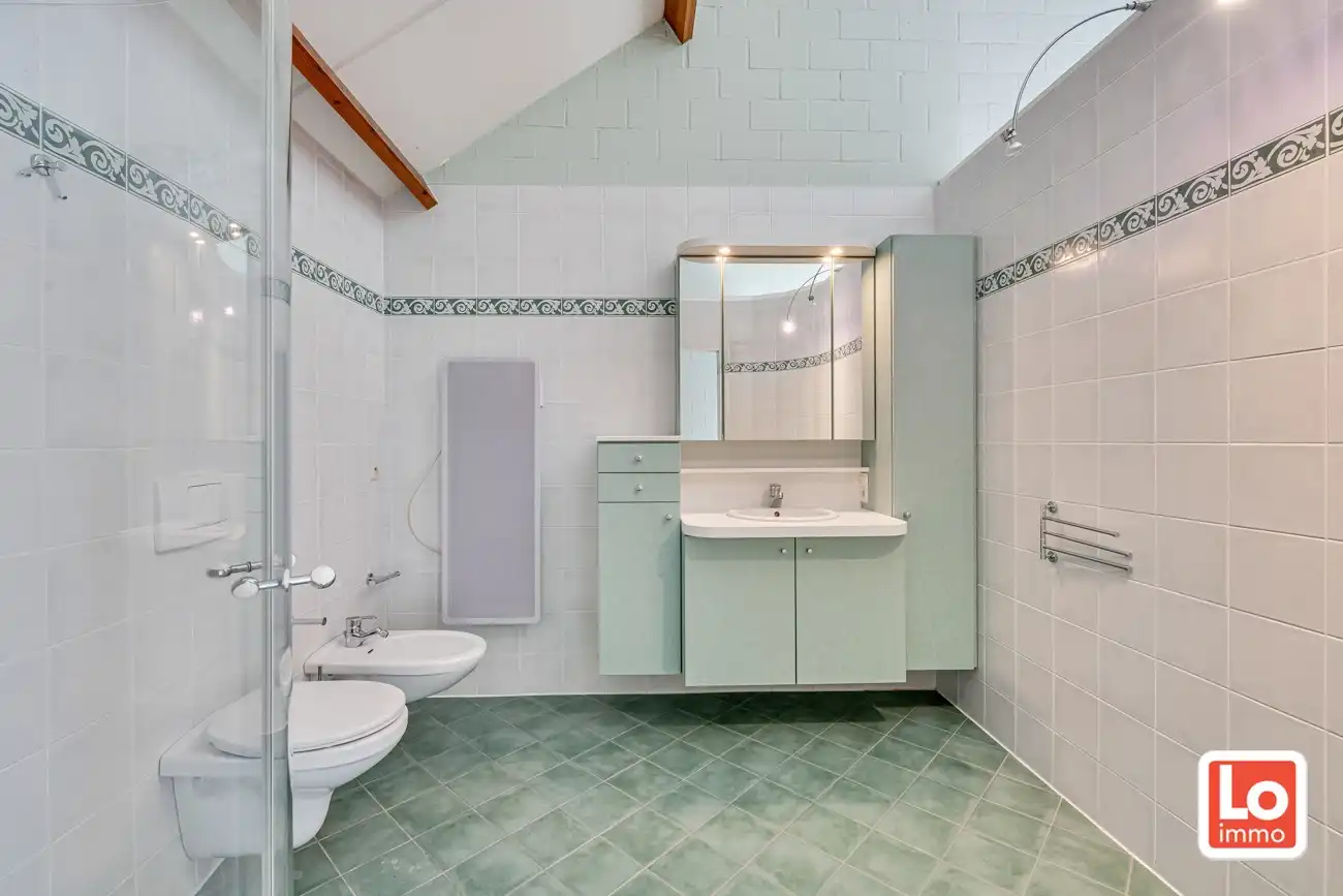 Degelijke open (kangoeroe)woning met inpandige garage en gezellige zuidwest georiënteerde tuin op een rustige locatie nabij het centrum van Lochristi! foto 29