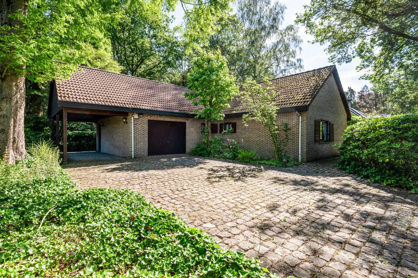 Wonen in het groen – vrijstaande woning met vijvertuin in Sint-Job! foto {{pictureIndex}}