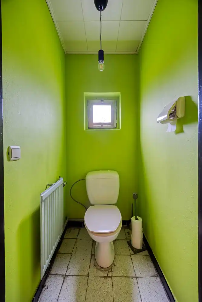 Te renoveren woning met veel potentieel gelegen in het centrum van Sint-Pieters-Leeuw foto 12