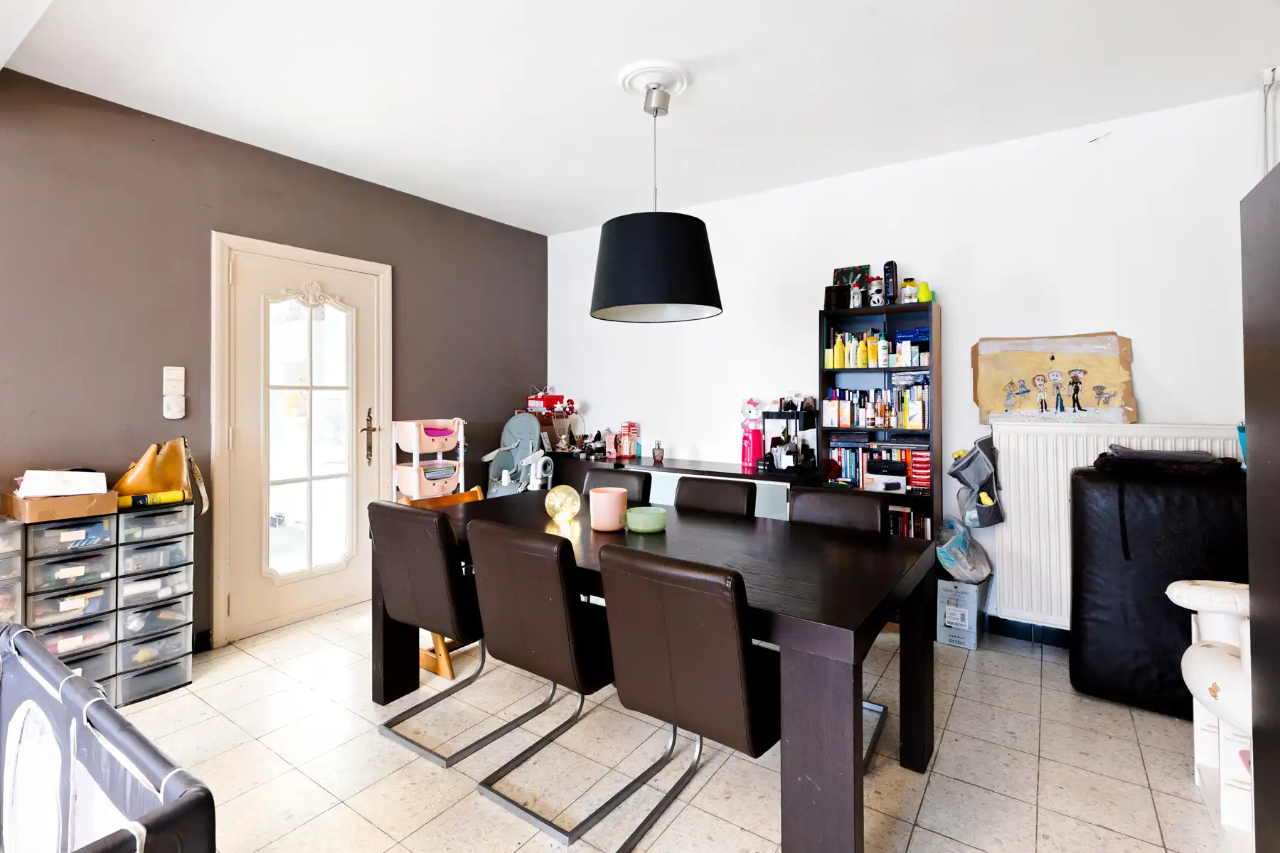 Karaktervolle gezinswoning met potentieel en zonnige tuin. foto 2