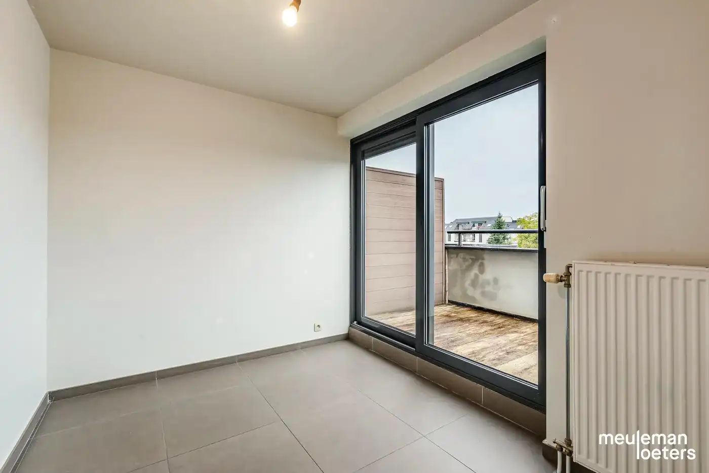 Lichtrijk en eigentijds penthouse met drie slaapkamers, twee terrassen en overdekte parkeerplaats foto 6