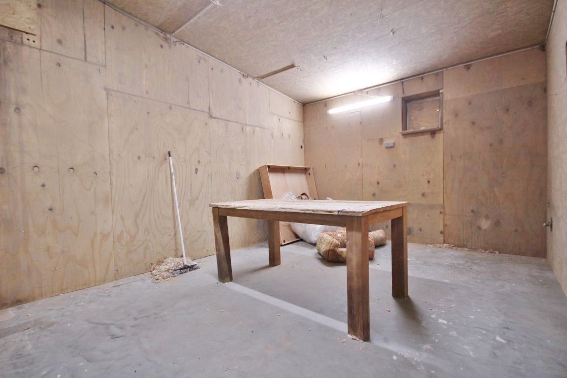 Ruim en functioneel magazijn op toplocatie in Sint-Truiden foto 7