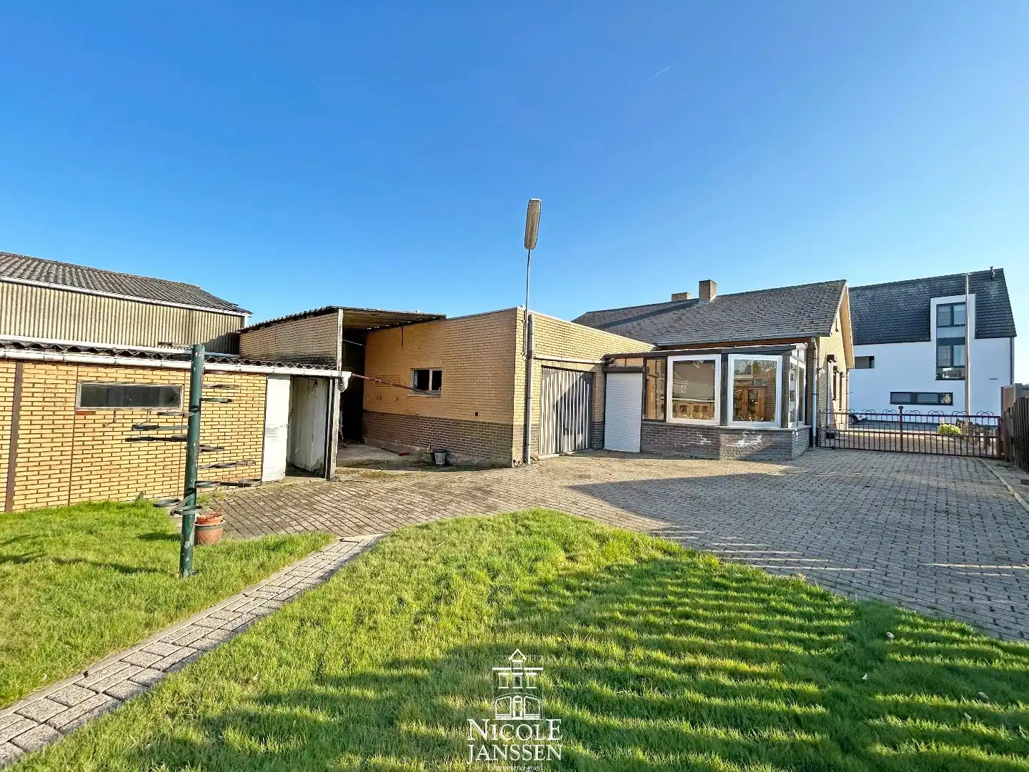 Verzorgde gelijkvloerse woning met tuin in verzorgde straat in centrum van Dilsen foto 17