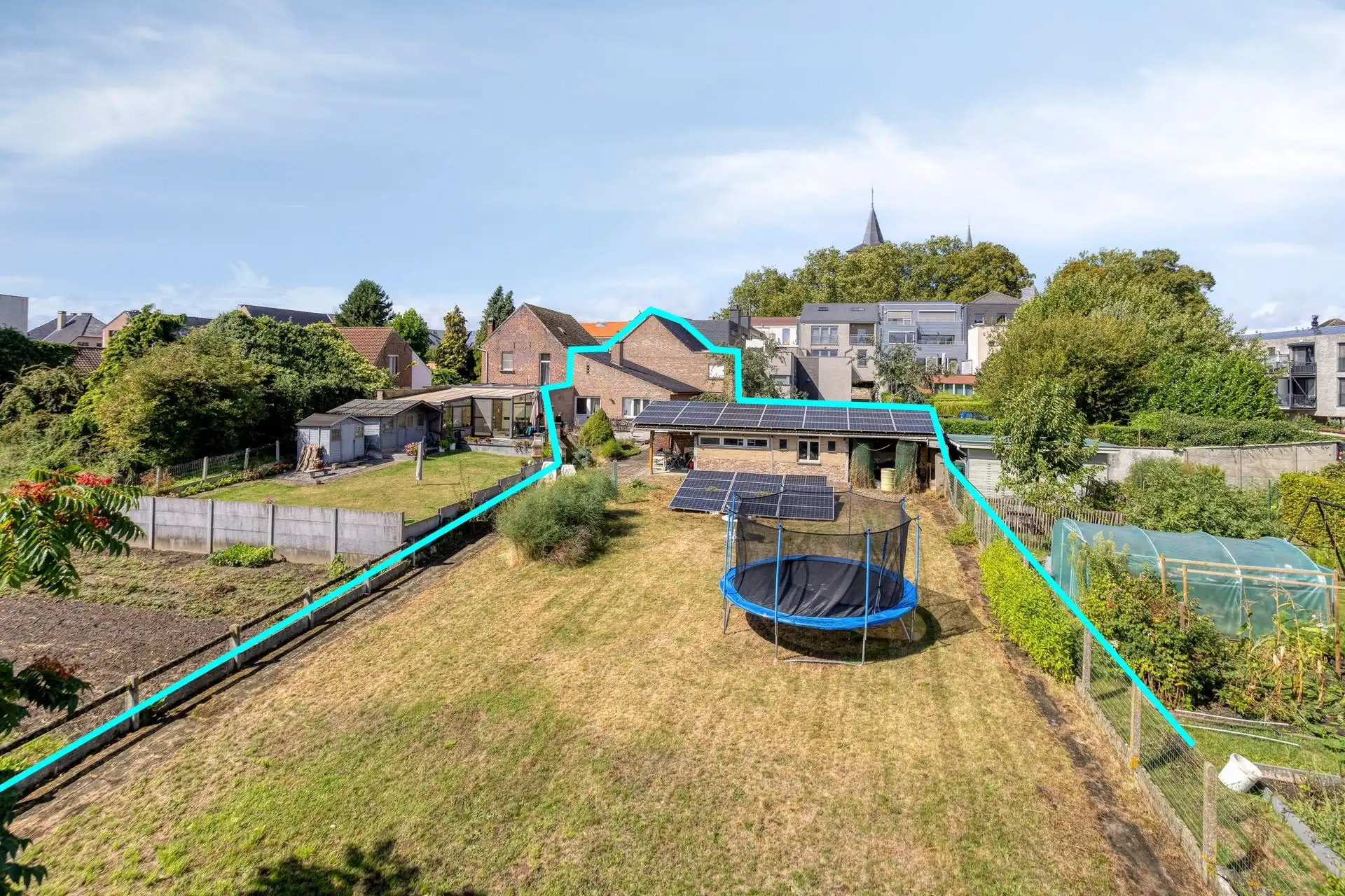 CENTRUM SINT-PIETERS-LEEUW : ruime 2-gevelwoning met atelier/commerciële ruimte (3 slpks) met grote tuin en private autostaanplaats foto 3