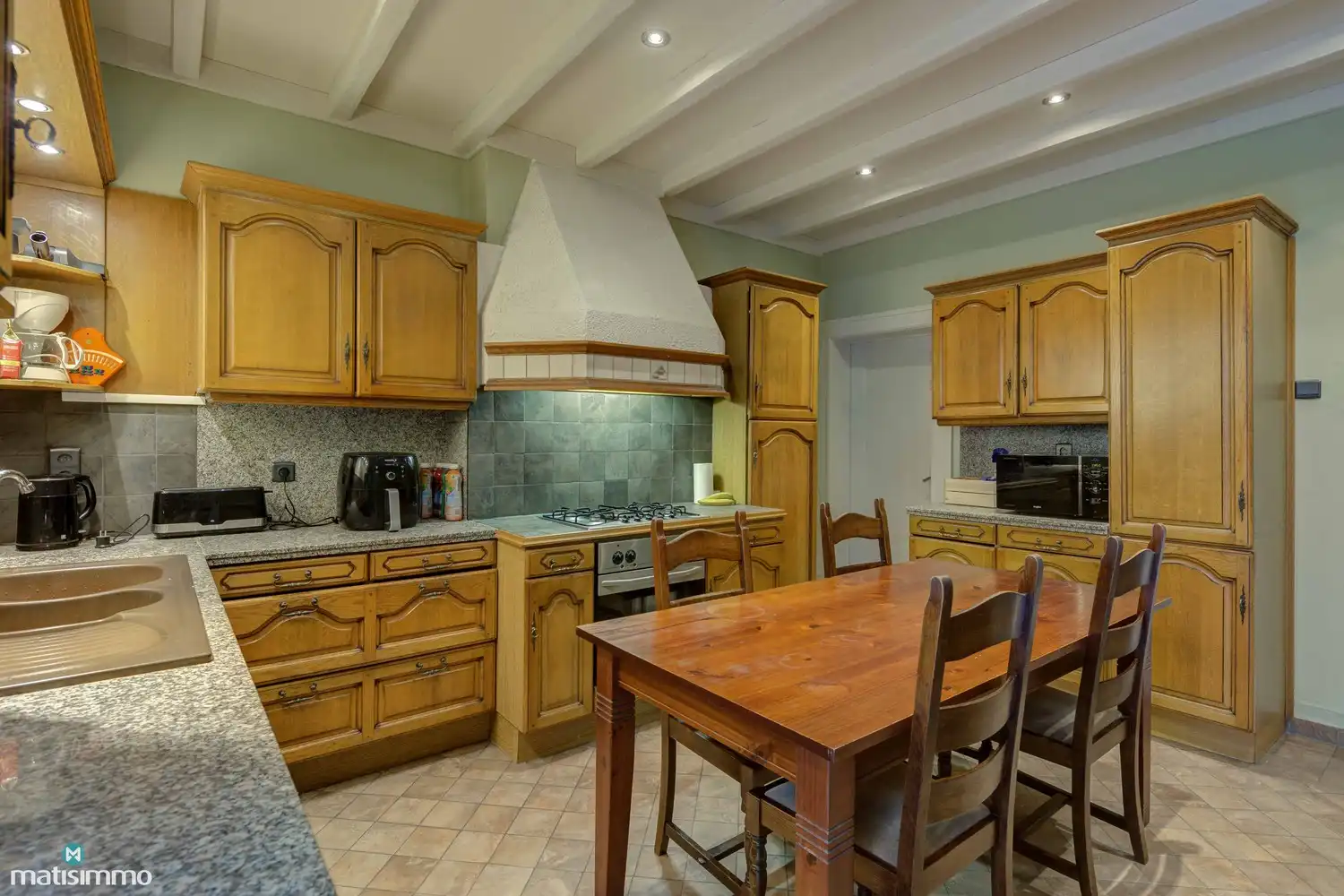 KARAKTERVOLLE WONING MET 5 SLAAPKAMERS EN RUIM PERCEEL TE GENK foto 9