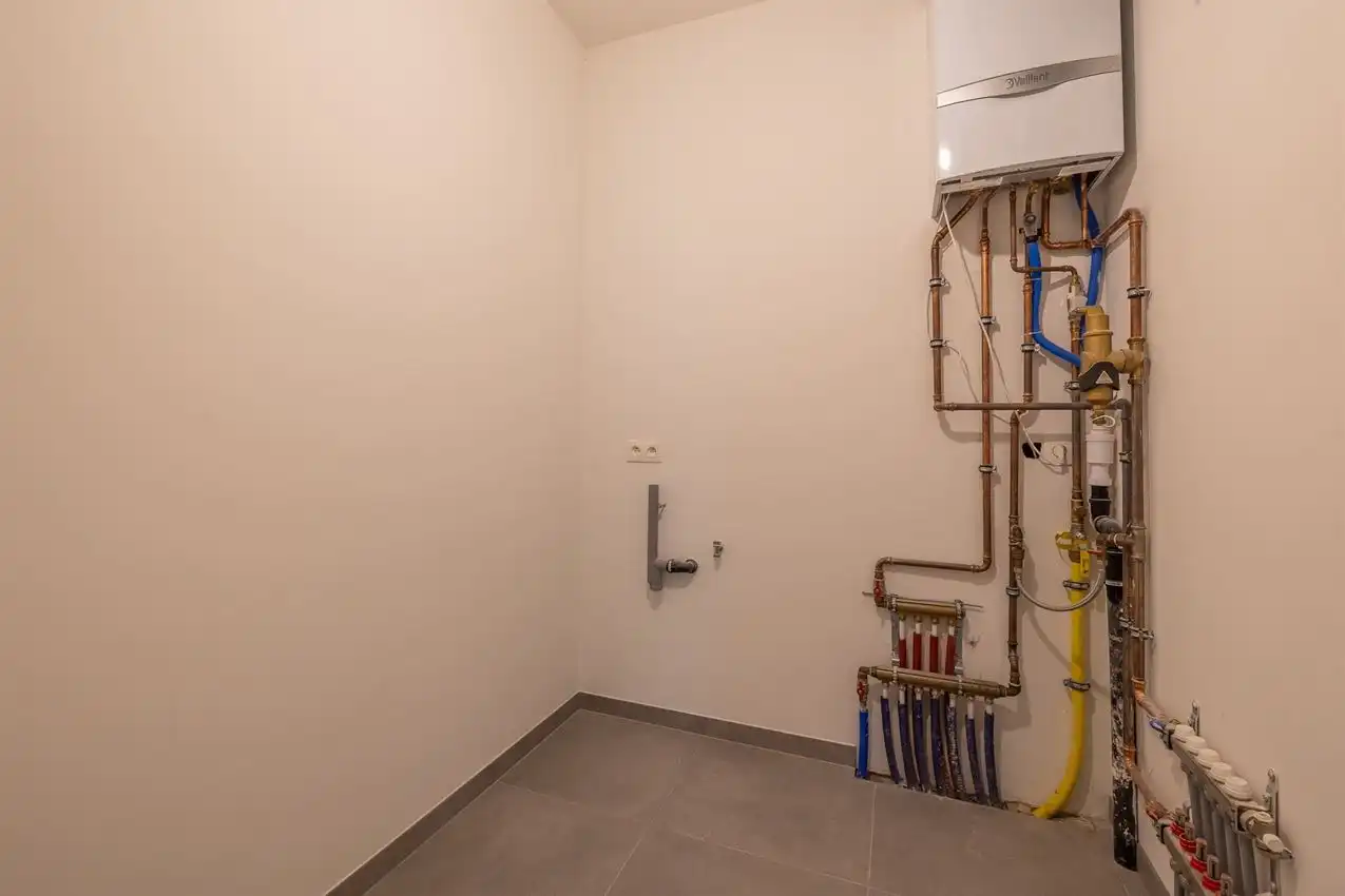 Nieuwbouwappartement met 1 slpk, autostaanplaats en terras foto 13