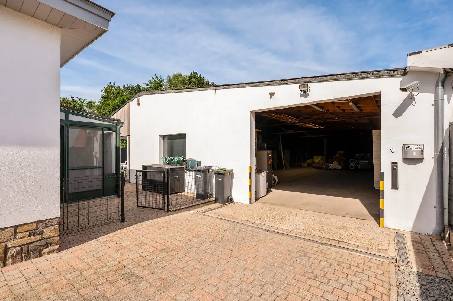 Ruime, degelijke gezinswoning met magazijn op een perceel van 930 m². foto 34