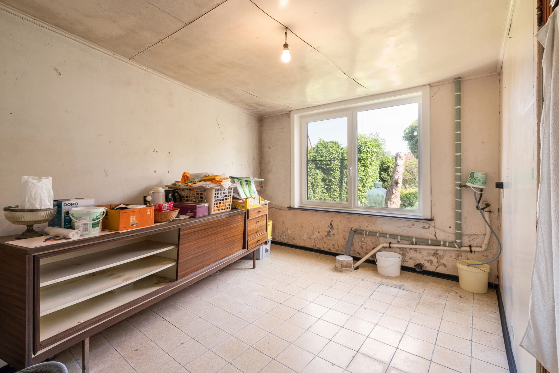 Te renoveren woning met 4 slaapkamers en mooie tuin in het rustige Haaltert foto 16