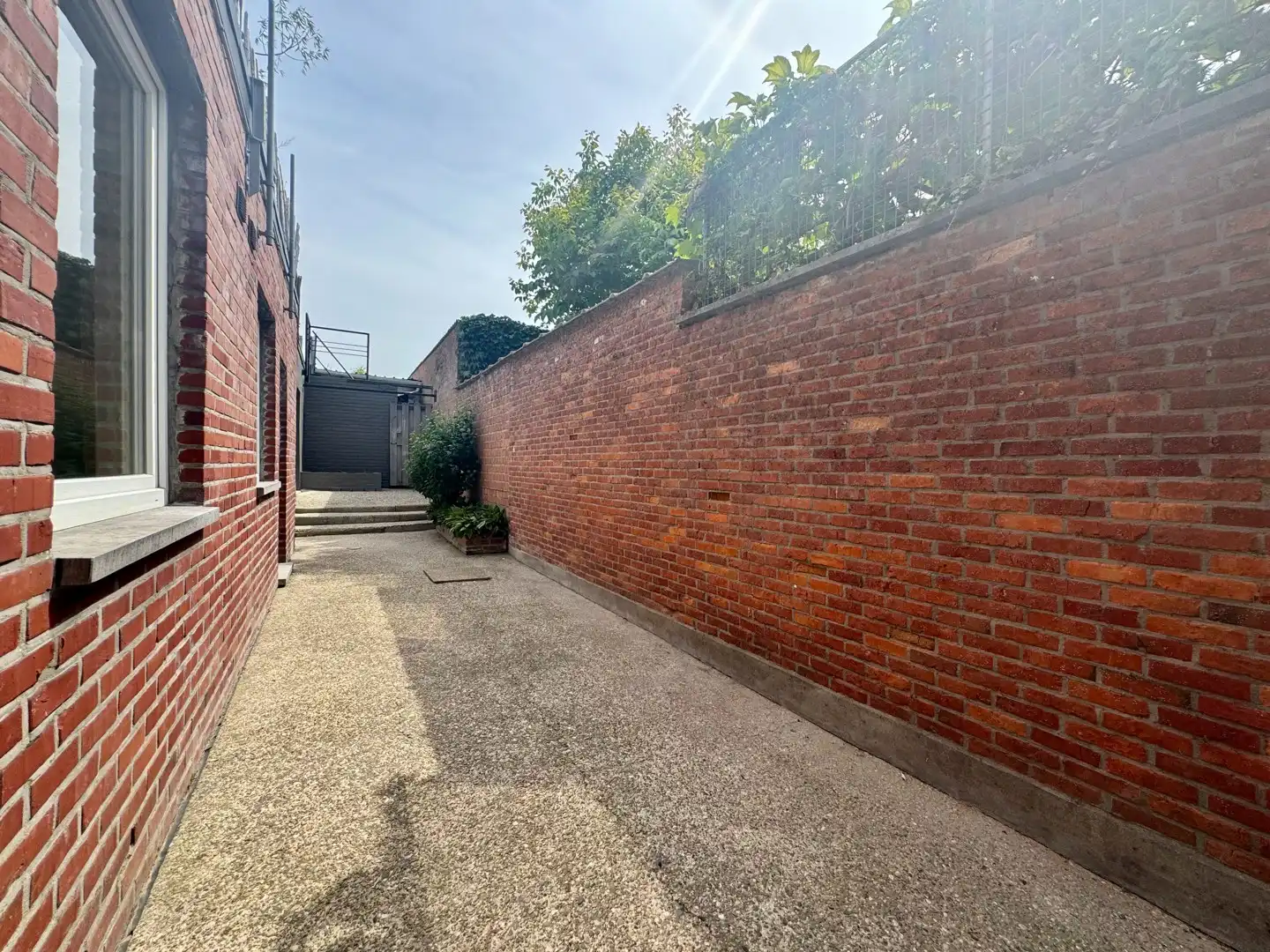 Ruim gerenoveerd gelijkvloers appartement met dubbele garage in het centrum van Diepenbeek foto 15