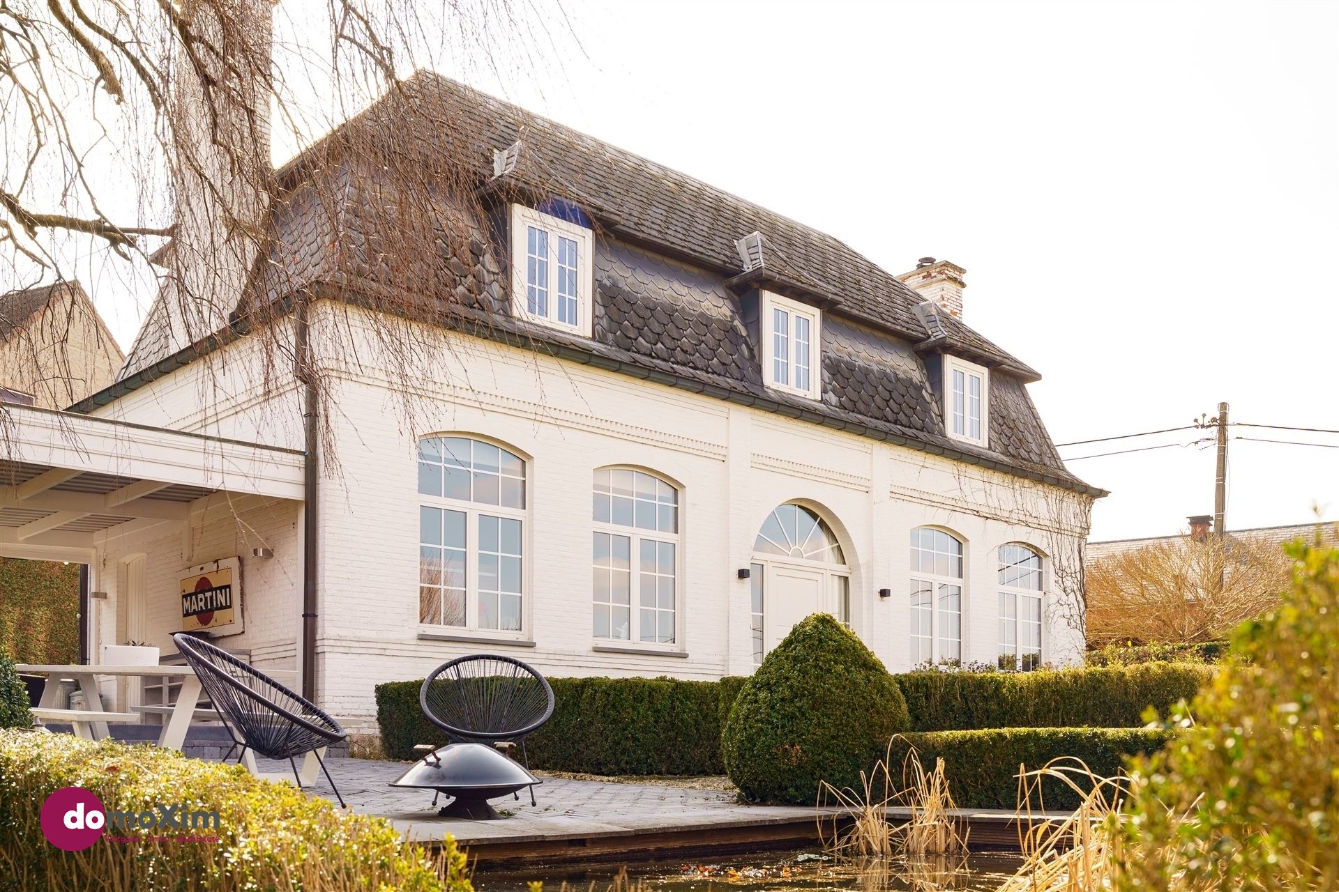 Hoofdfoto van de publicatie: Prachtig herenhuis met ruime tuin en zwembad nabij Leuven