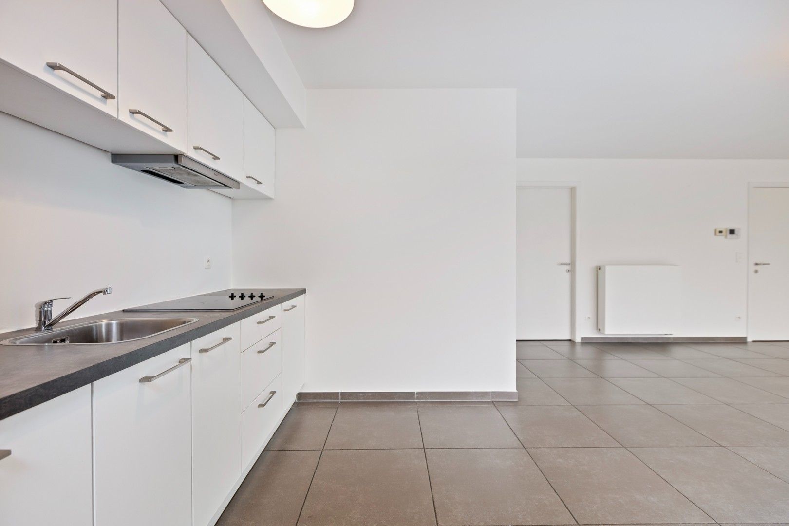 Te koop: lichtrijk appartement in hartje Genk foto 11