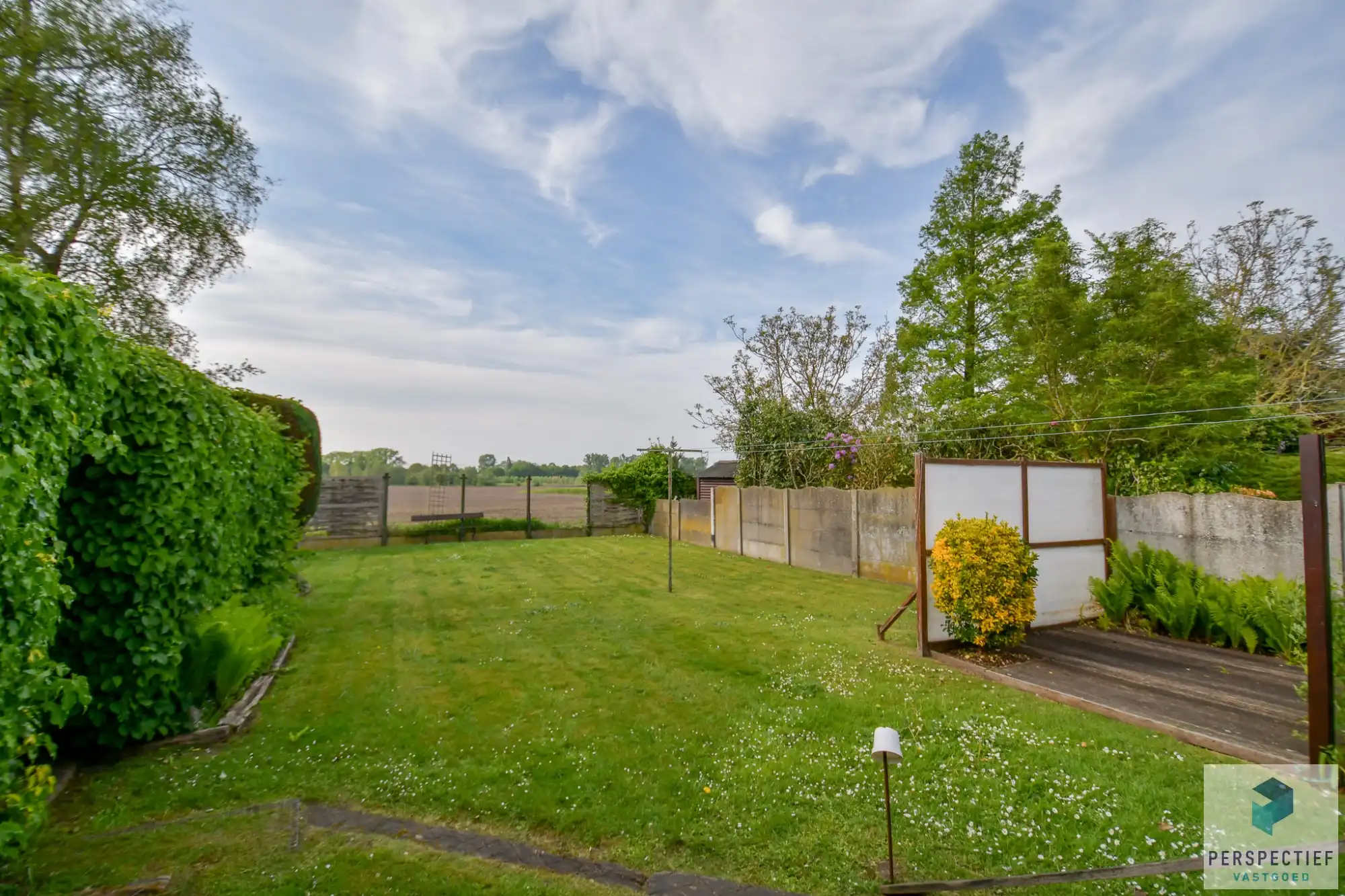 Rustig en centraal gelegen woning met landelijk uitzicht, grote garage en tuin foto 4