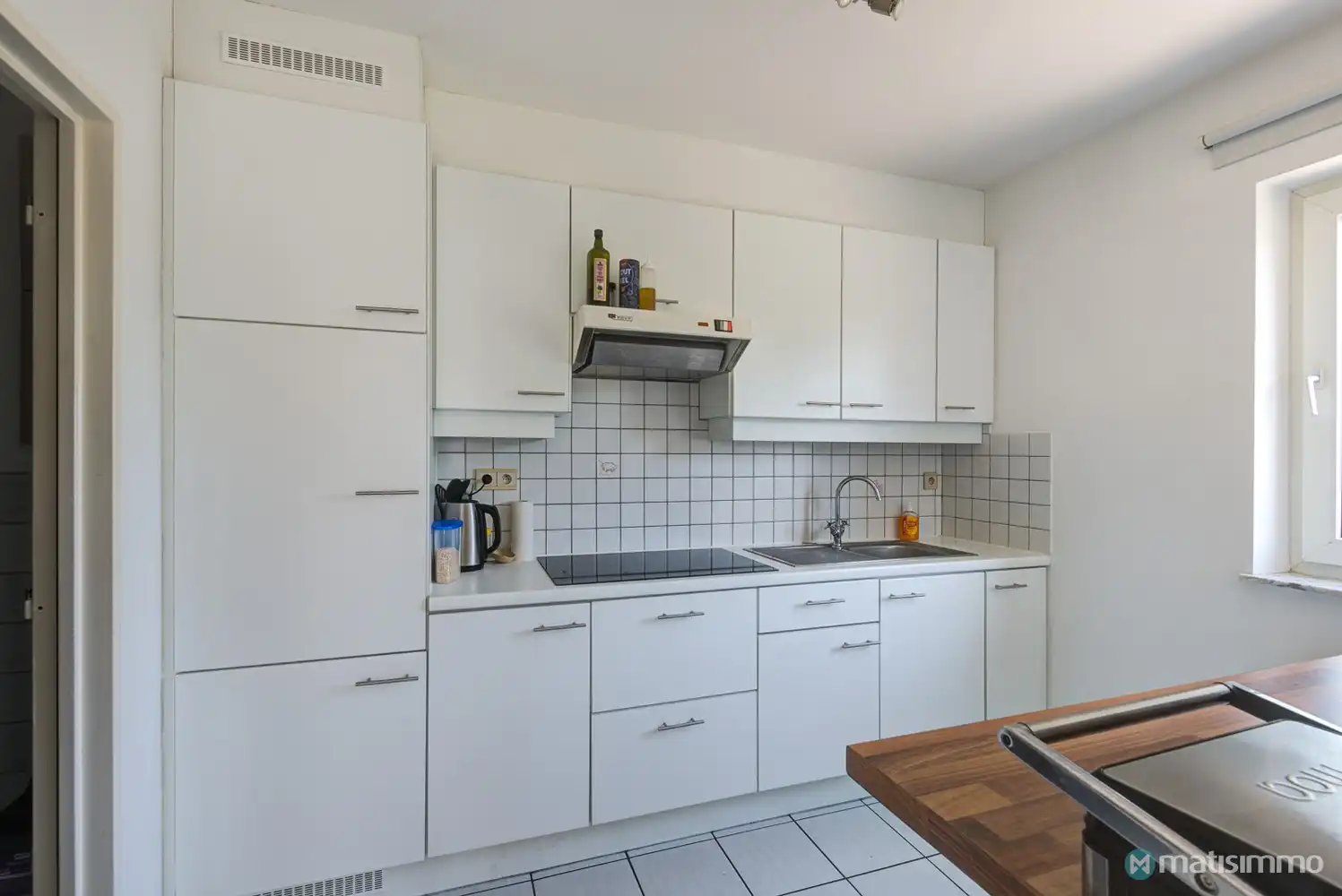 GUNSTIG GELEGEN APPARTEMENT MET 2 SLAAPKAMERS, GARAGE EN AUTOSTAANPLAATS TE BILZEN foto 5