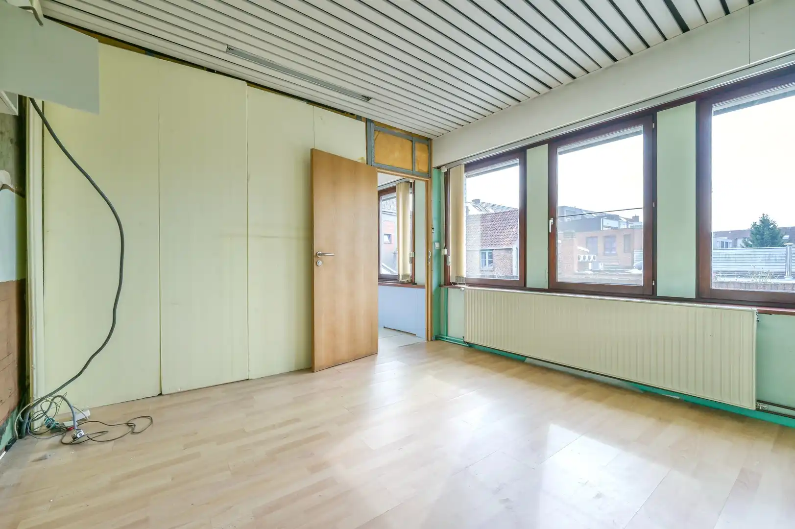 Zeer ruim duplex-appartement aan dorpsplein te Bornem foto 11
