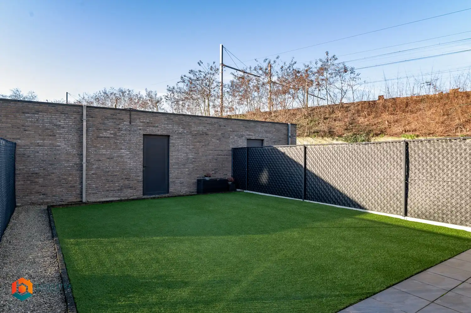 Instapklaar gelijkvloers appartement met 2slpkrs en tuin foto 17