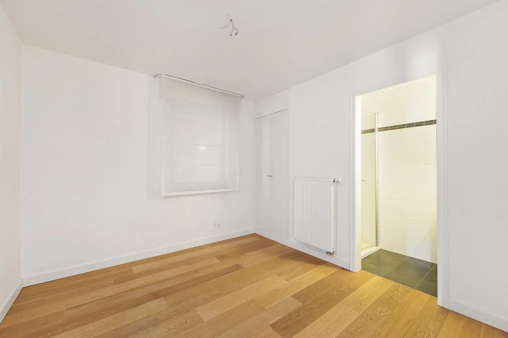 Gelijkvloers appartement met 2 slaapkamers en garage! foto 16