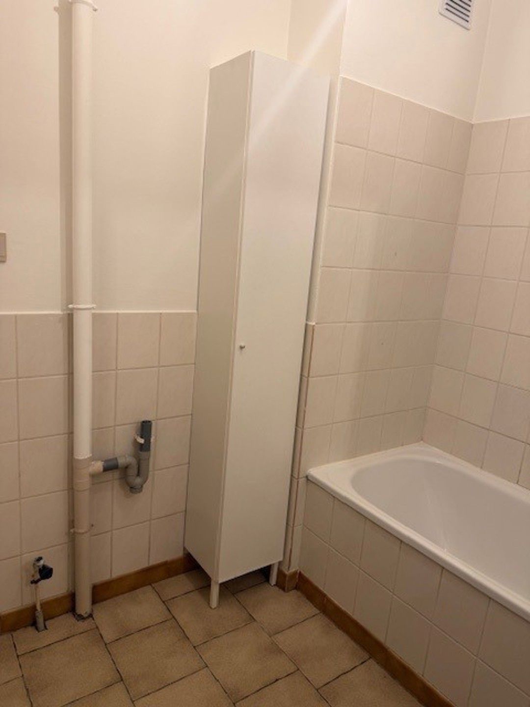 Deels gerenoveerd gelijkvloers appartement. foto 11