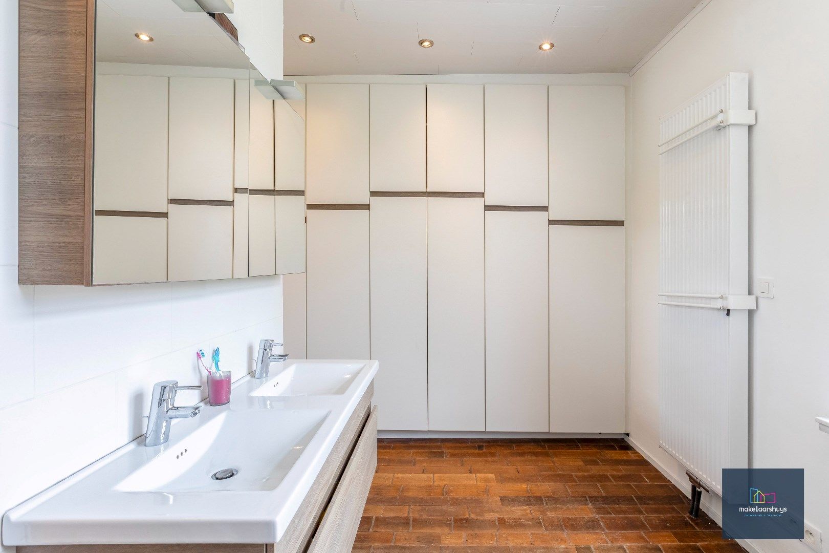 Instapklare woning met aangename tuin en garage foto 14