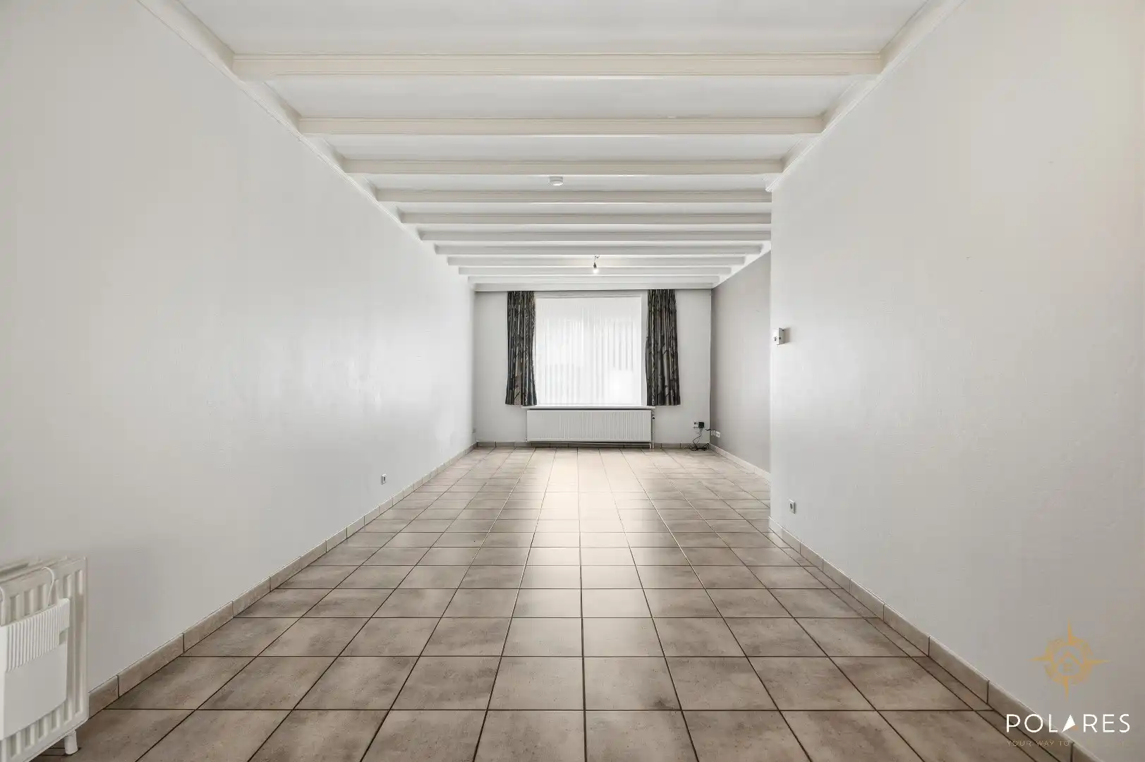 Instapklare rijwoning met 4 slaapkamers en leuke tuin! foto 6