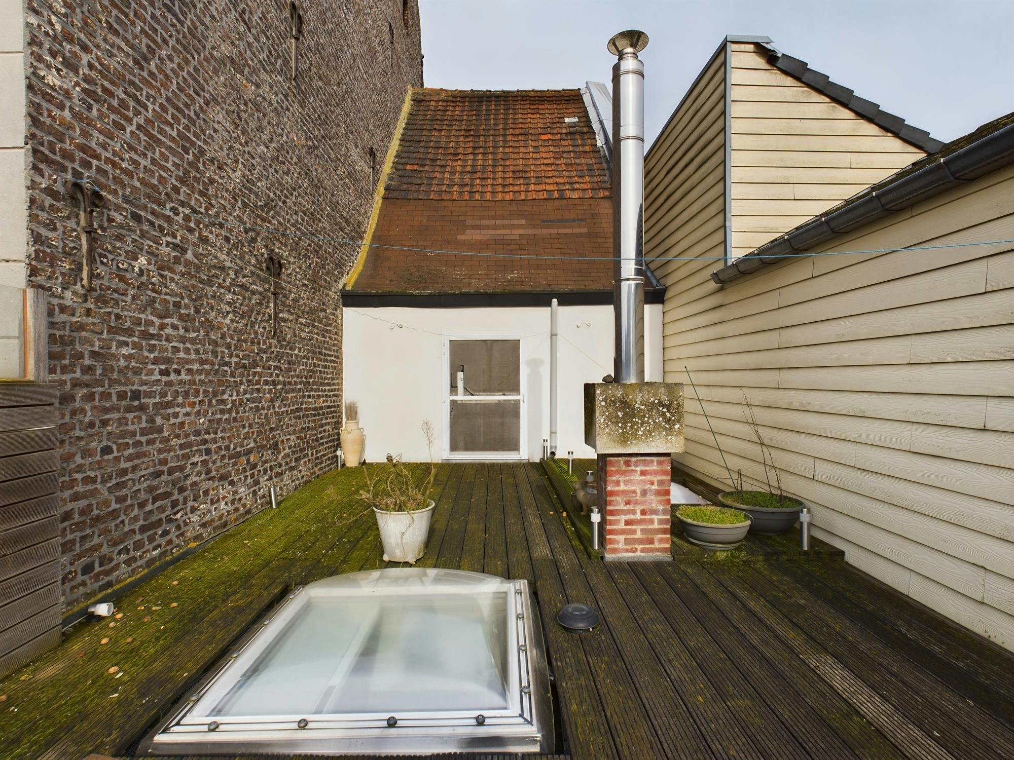 Goed draaiende dagbladhandel op de winkelstraat van Maaseik te koop foto 10
