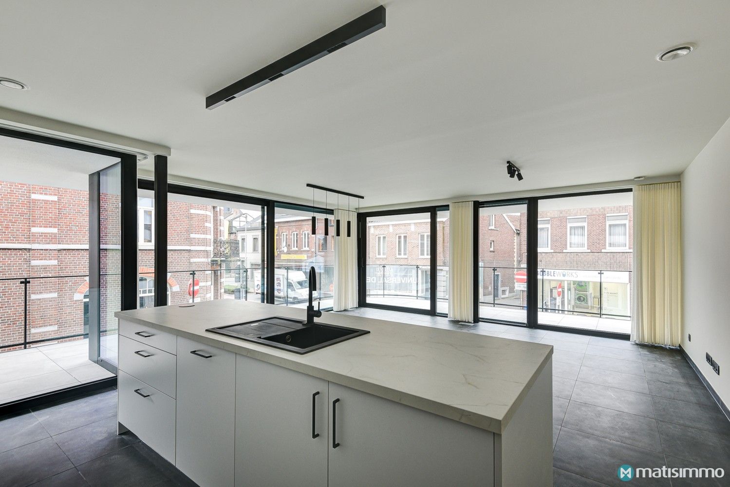 ENERGIEZUINIG APPARTEMENT MET 2 SLAAPKAMERS EN PARKEERPLAATS IN HET CENTRUM VAN BILZEN foto 5