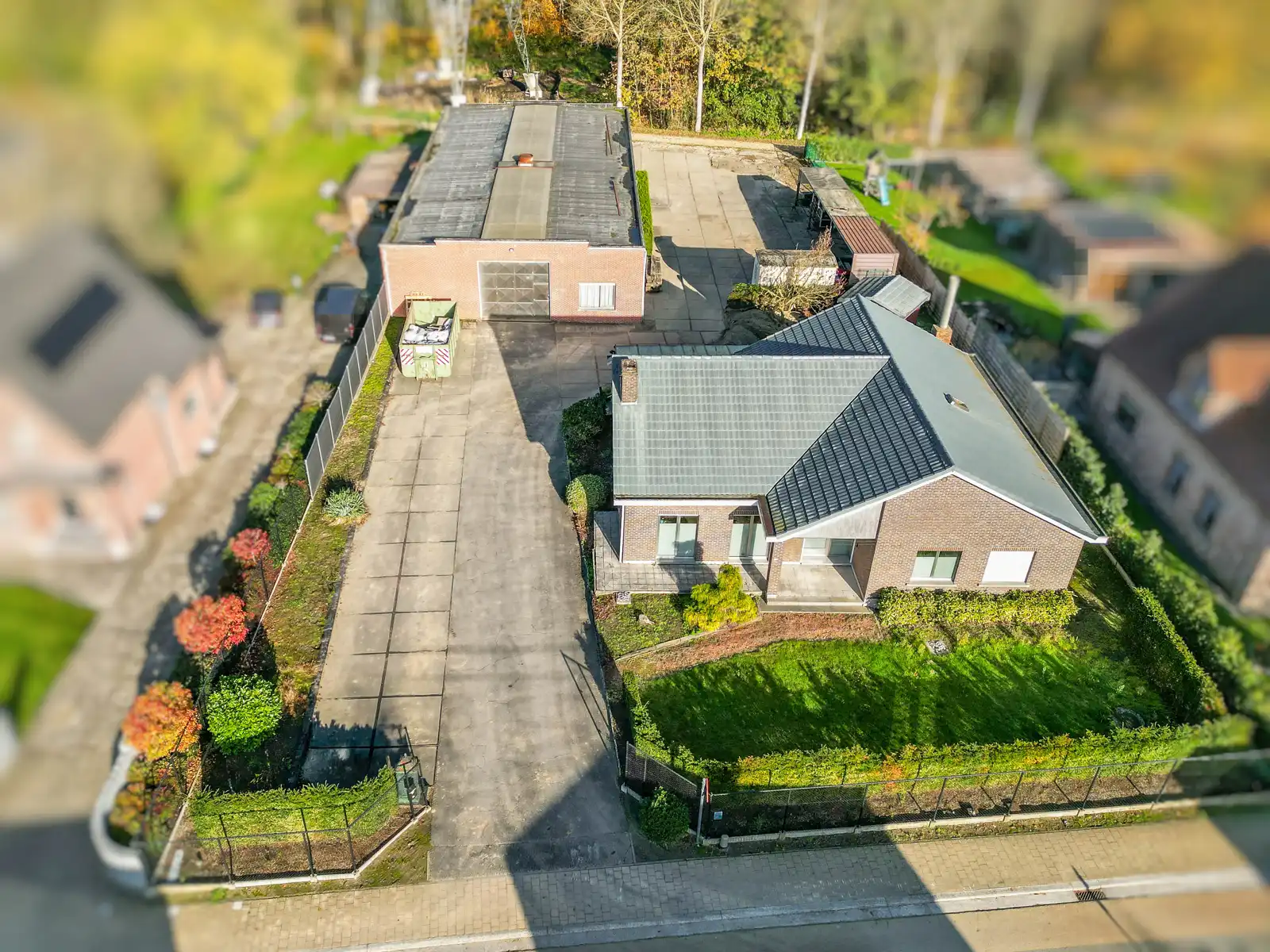 Vrijstaande woning mét magazijn op een perceel van 2277m² te Bornem foto 3