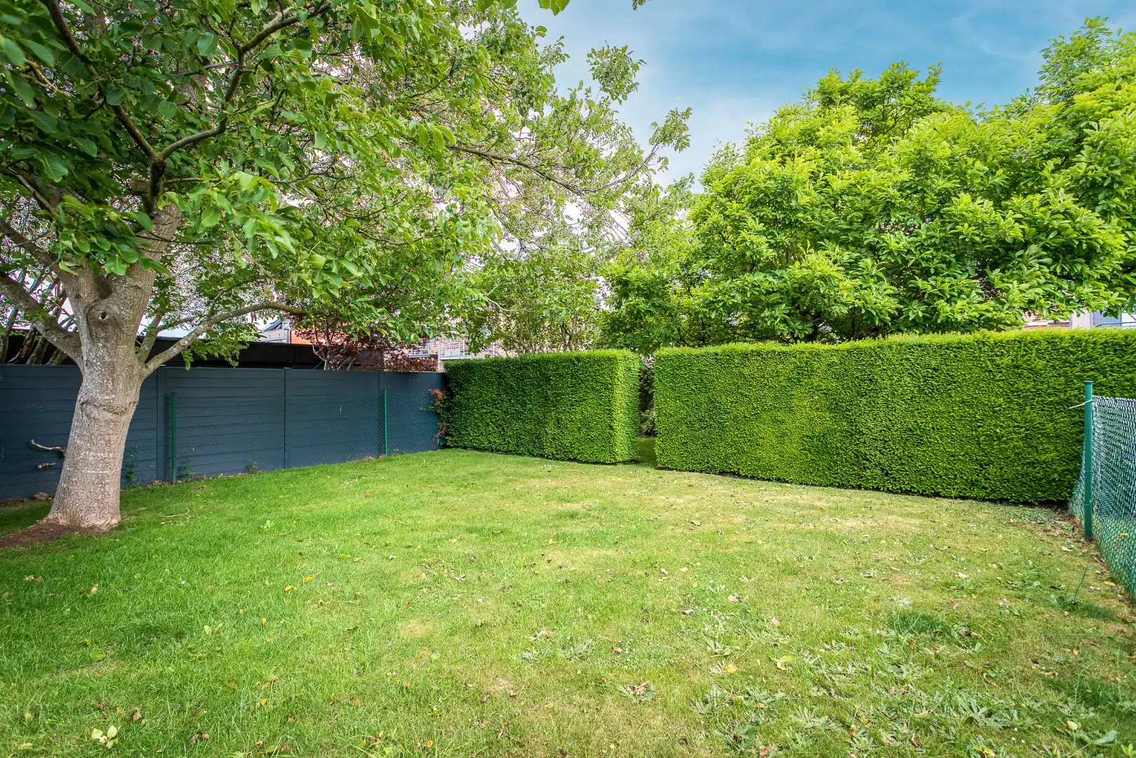 Verzorgde 3-gevelwoning met 3 slpk en tuin te Halle foto 11