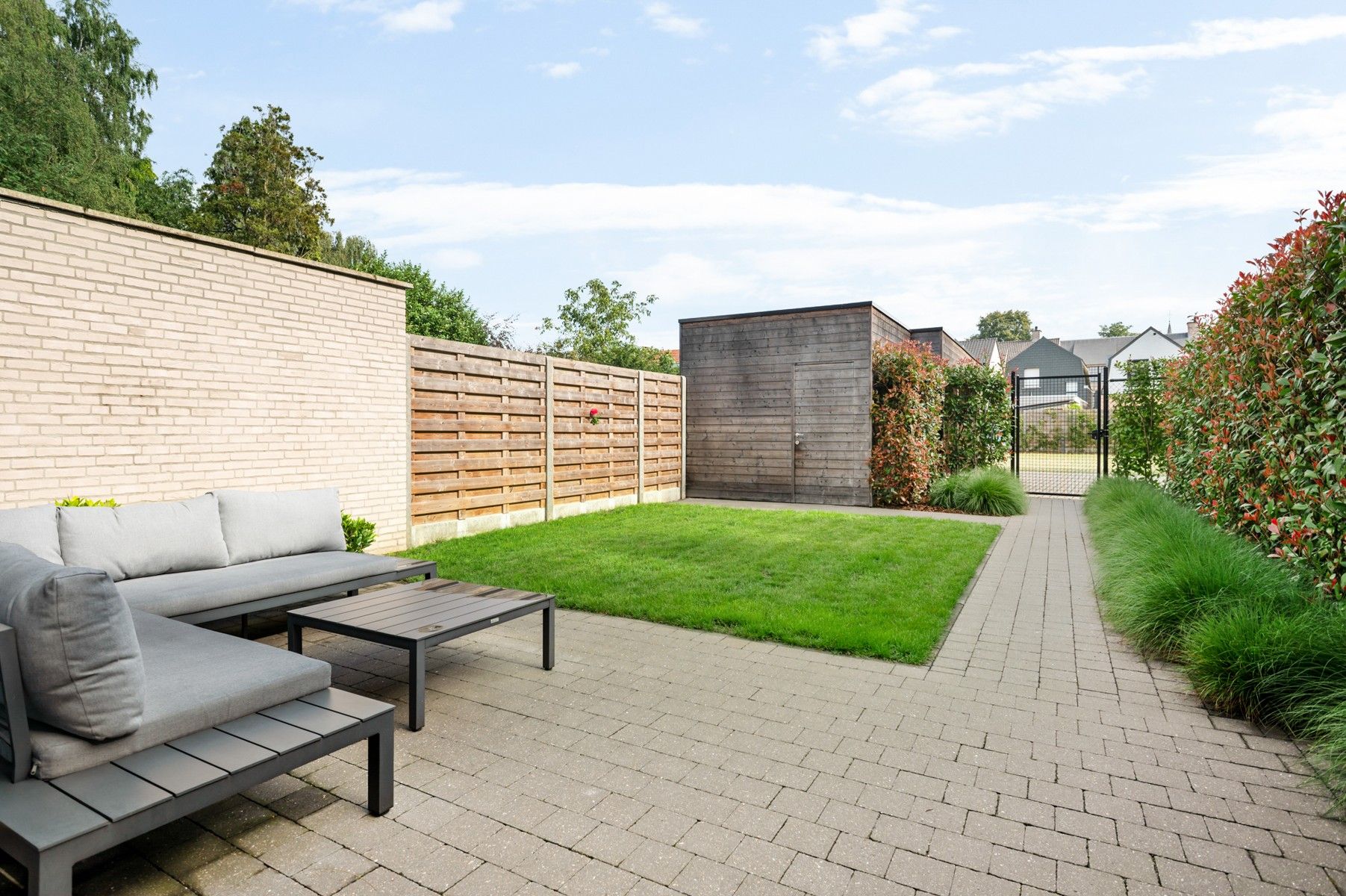 Instapklaar en energiezuinig gelijkvloers appartement met terras en tuin foto 8