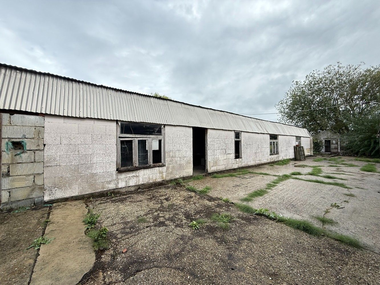 Woning met achterliggend magazijn op 15 are 29 ca. foto 22