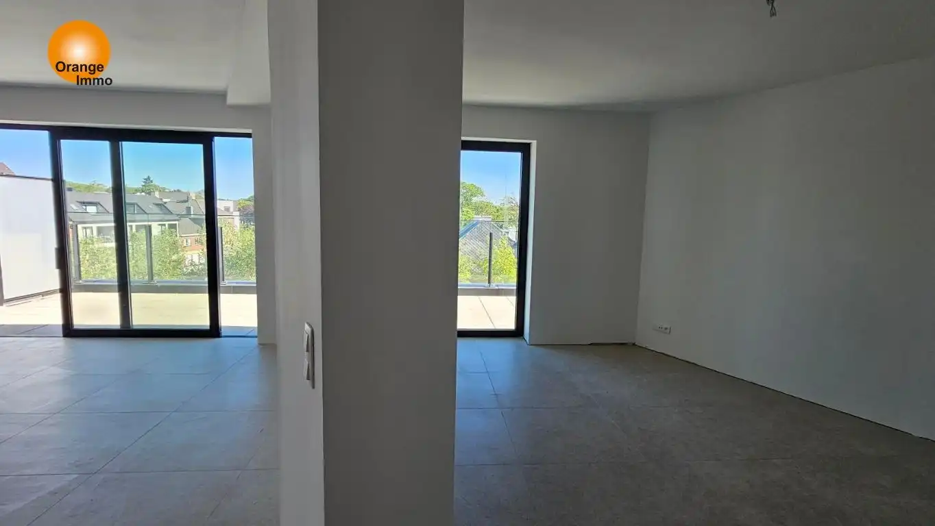Nieuwbouwappartement met één slaapkamer gelegen in het commercieel en bruisend centrum van Eisden. Een appartement voor wie wil wonen in een gezellig en comfortabel complex voorzien van tal van faciliteiten. foto 5