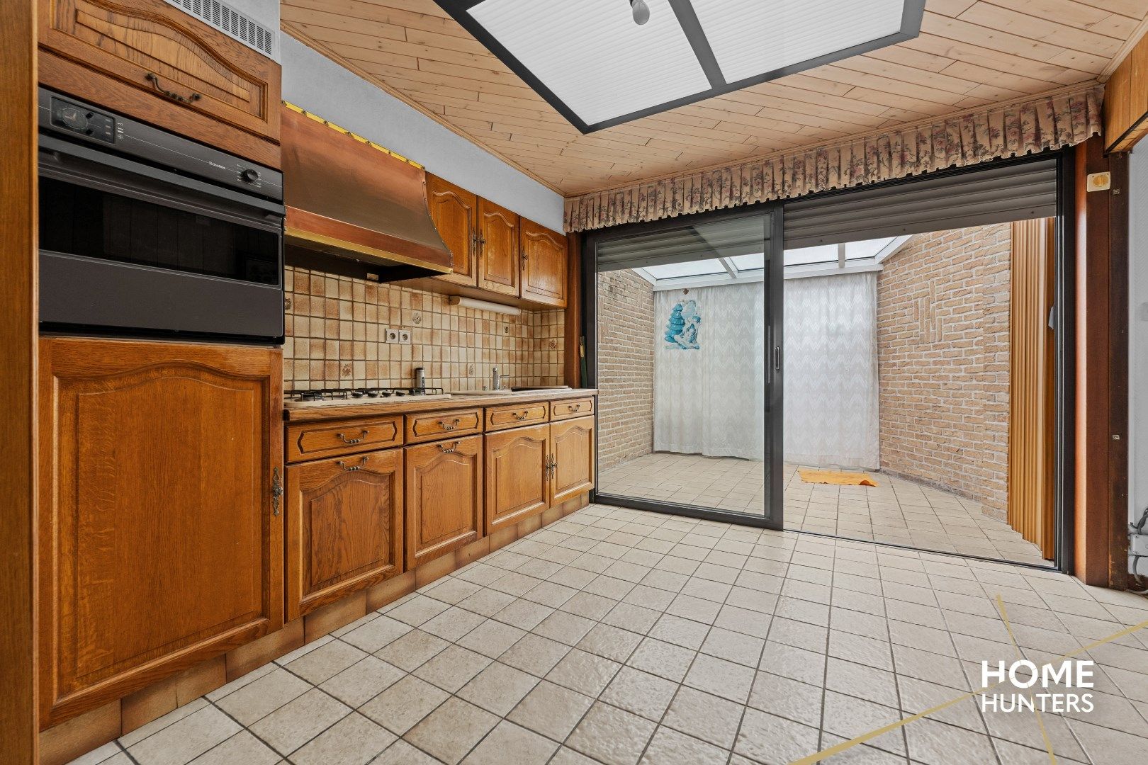Woning met uitgestrekte tuin in de stadskern van Mesen foto 12
