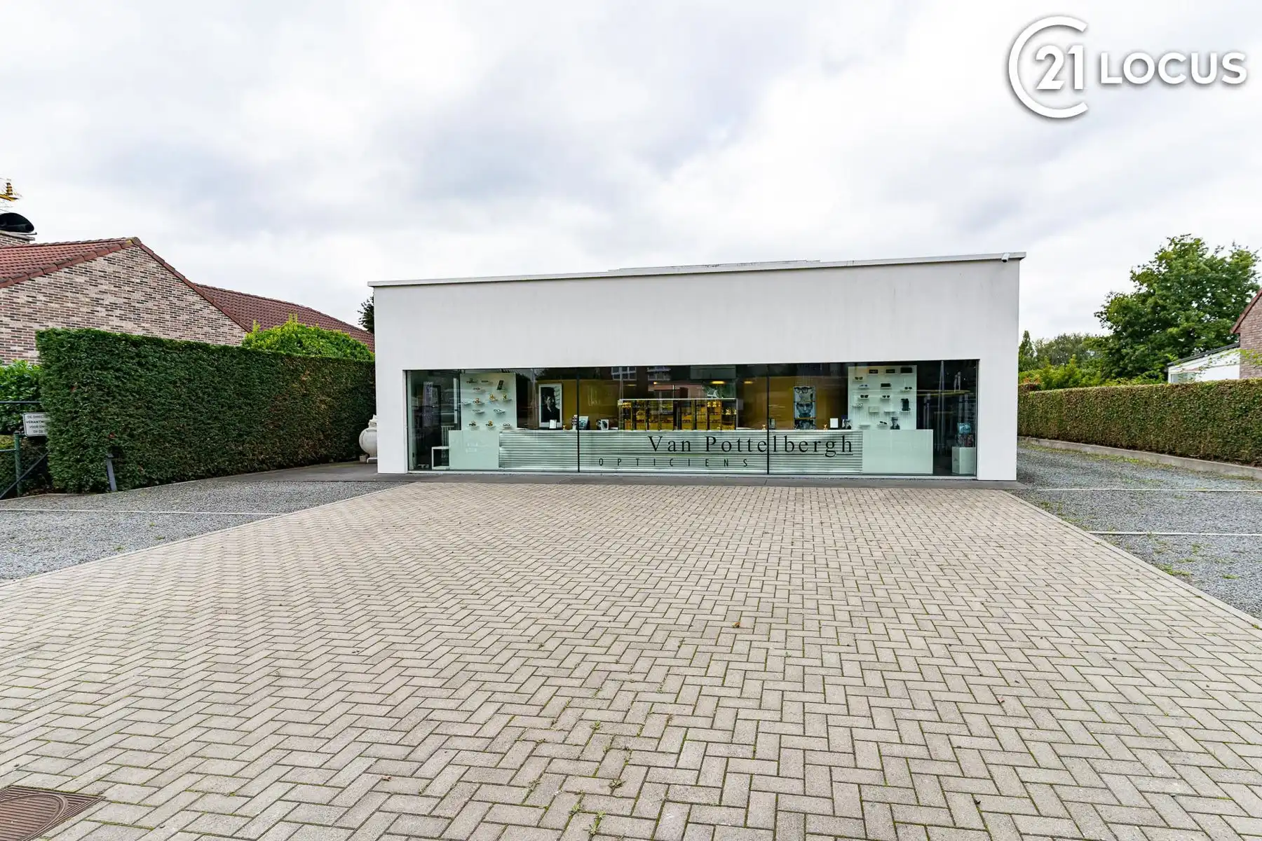 Handelsruimte met woonst & 6 parkings te koop in Kruibeke foto 6