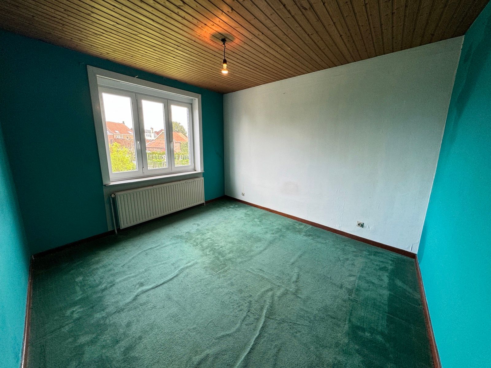 Eengezinswoning met 4 slaapkamers, garage en tuin foto 13