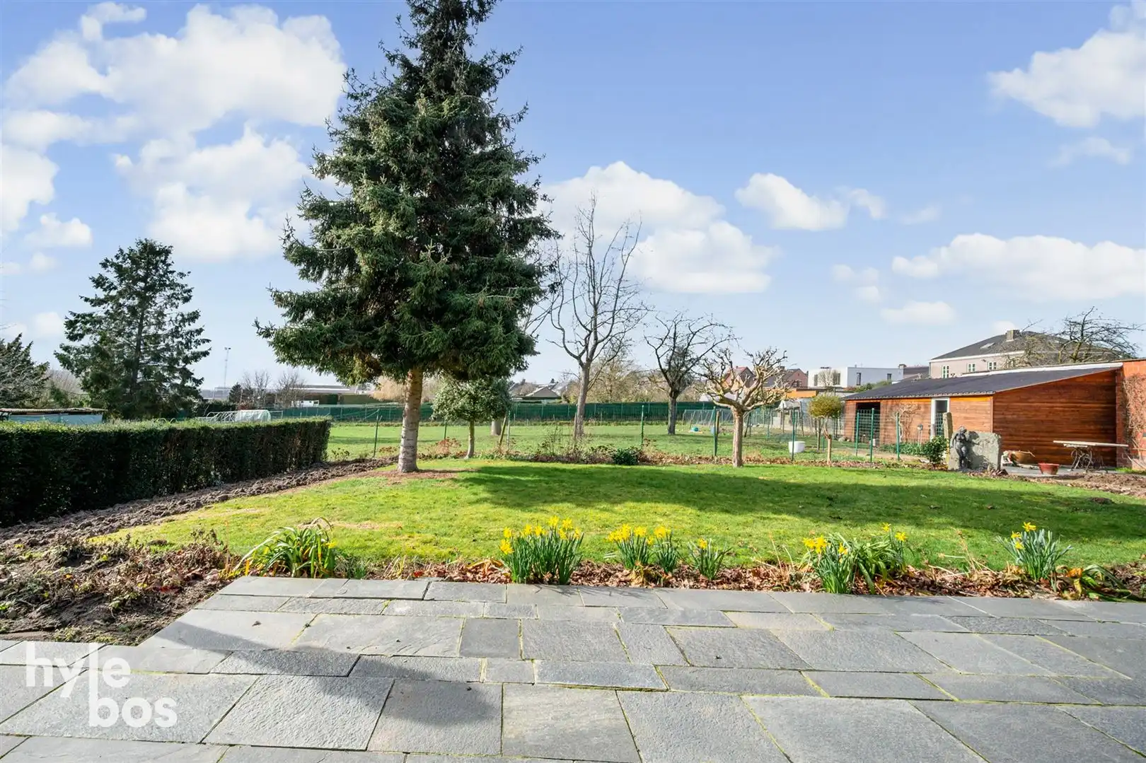 Ruime open bebouwing met 4 slaapkamers, garage en tuin in zeer rustige ligging foto 23