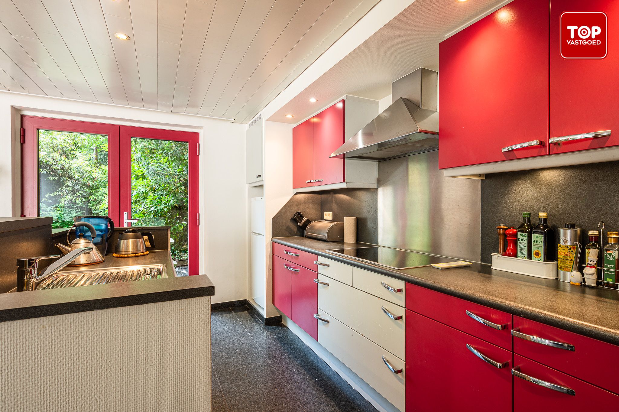 Charmante halfopen woning met fantastische tuin op een Topligging in Sint-Denijs-Westrem foto 10